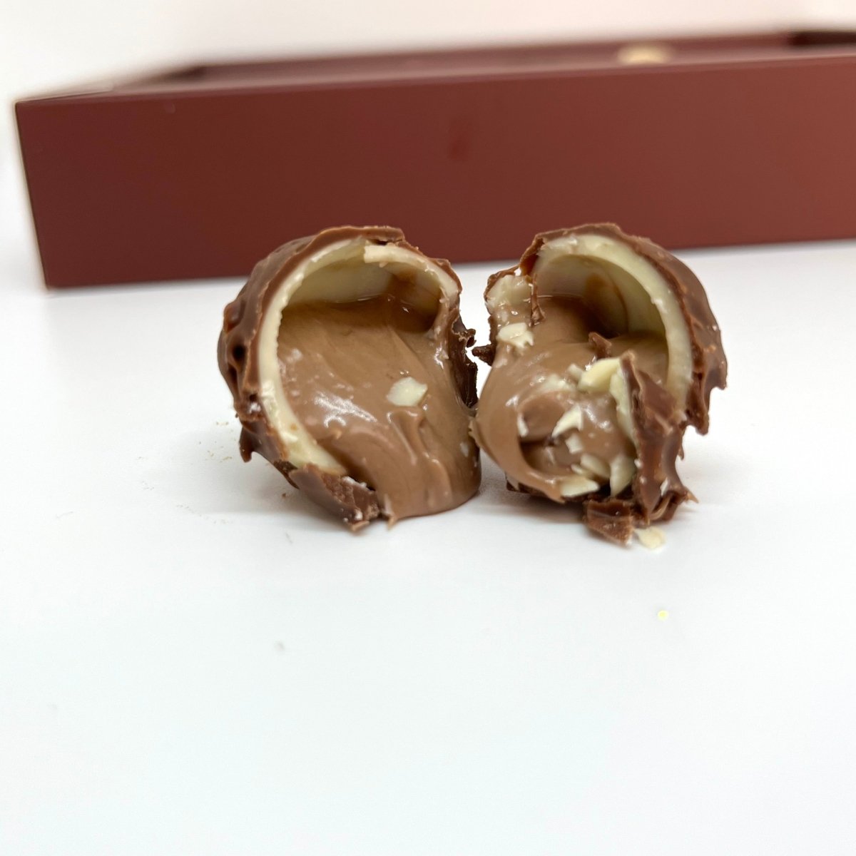 Ema Chocolate Milk and White Chocolate Truffles with Hazelnut Cream Filled - Merry Christmas Box - 250g - TryAladdin